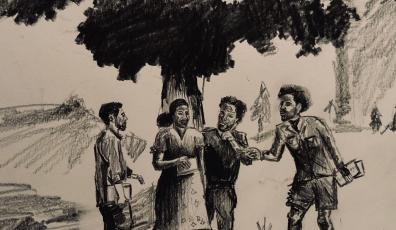 Four people standing under a tree and engaging in conversation.