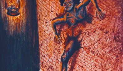 A woman breaking through a wall towards a lamp.