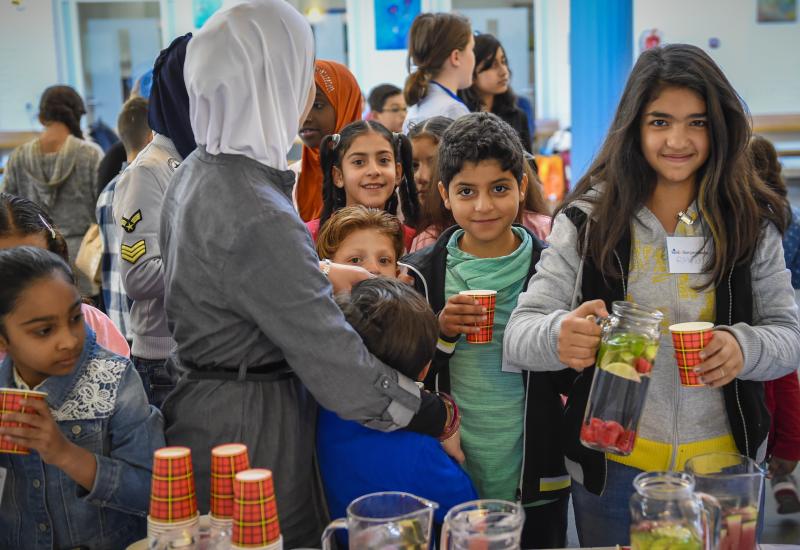 A group of refugees at a celebration event