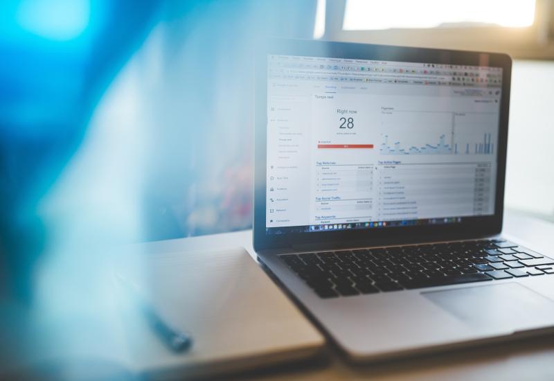 Open laptop showing data dashboard