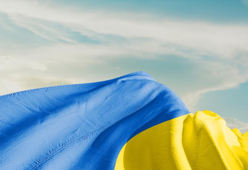 Ukraine flag with blue sky in the background