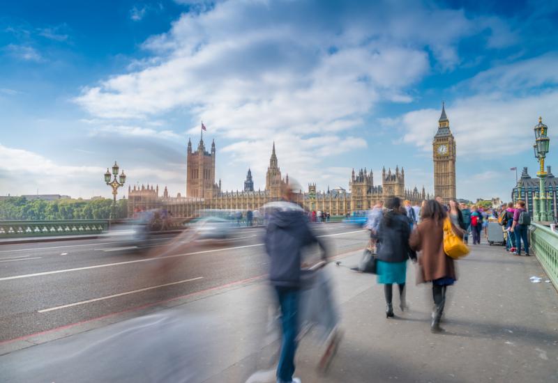 View of Houses of Parliament from bridge over river Thames