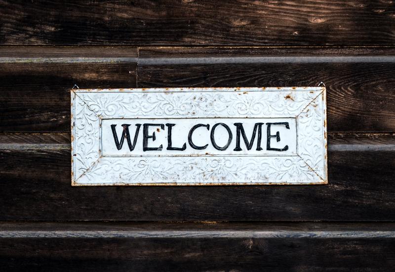 Welcome sign on wall