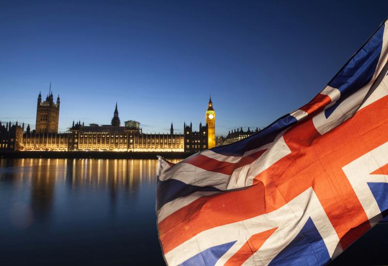 The Houses of Parliament with the Union flag