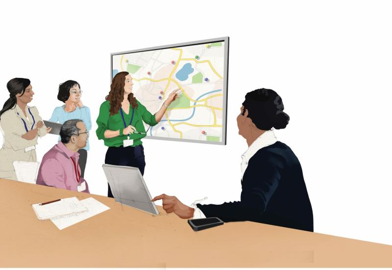 A group of stakeholder discussing ESOL support in an area