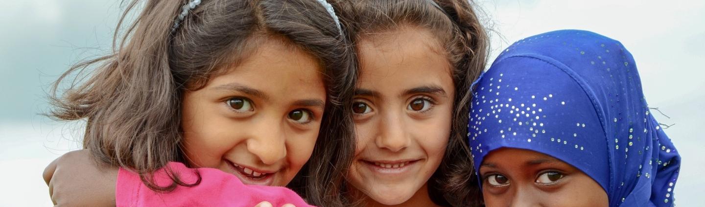 Three young refugee girls