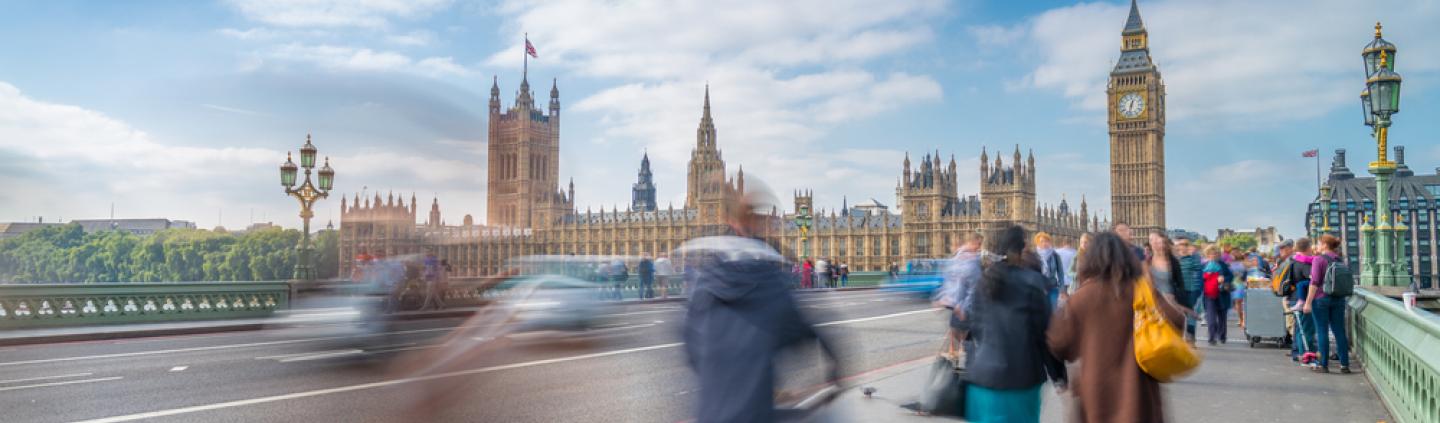 View of Houses of Parliament from bridge over river Thames