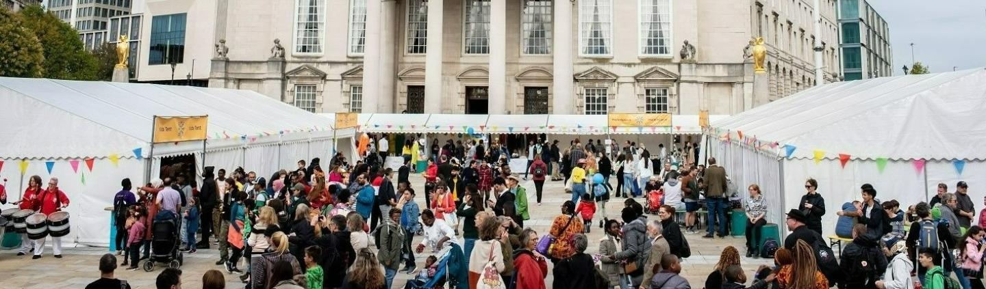 Yorkshire Integration Festival 2022 in Millennium Square in Leeds with Civic Hall in the background