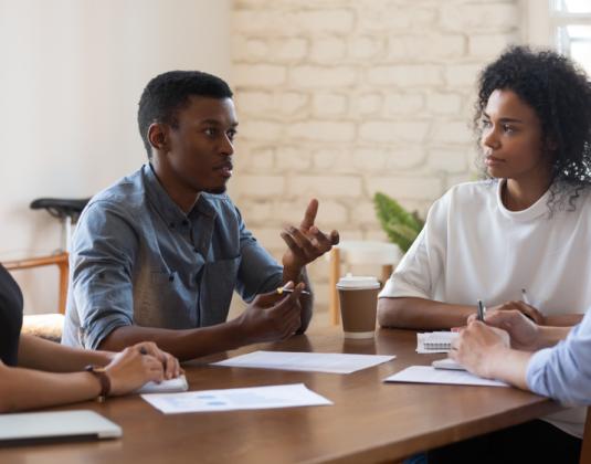 A group of people at attending a focus group