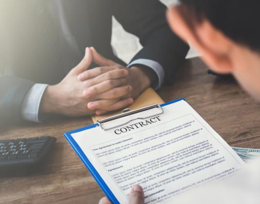 A person holding a contract of employment