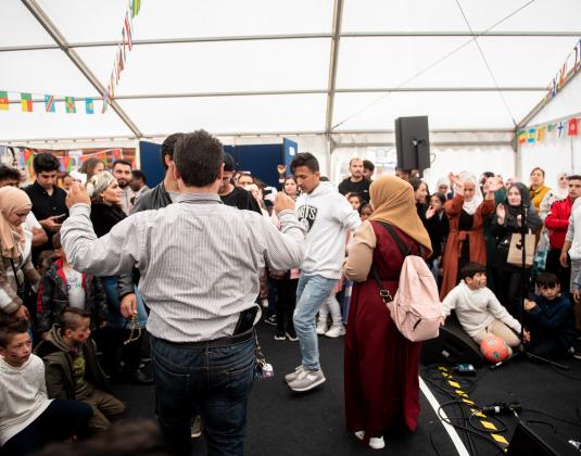 Crowds getting involved in the global village at the Yorkshire Integration Festival 2022