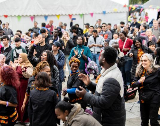 Crowds enjoying the acts on the main stage at the Yorkshire Integration Festival 2022