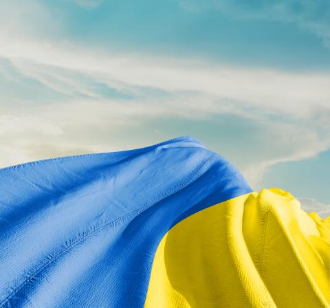 Ukraine flag with blue sky in the background