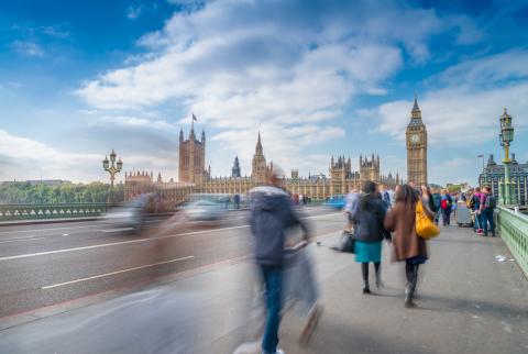 View of Houses of Parliament from bridge over river Thames