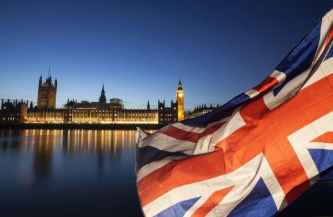The Houses of Parliament with the Union flag