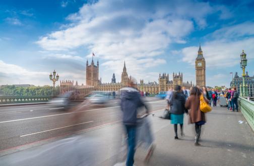 View of Houses of Parliament from bridge over river Thames