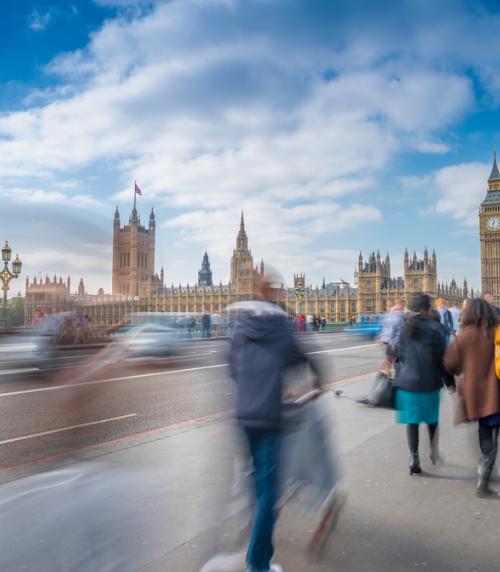 View of Houses of Parliament from bridge over river Thames