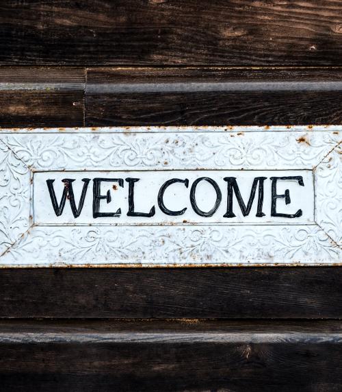 Welcome sign on wall