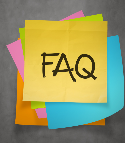 'FAQ' text on a sticky note paper.