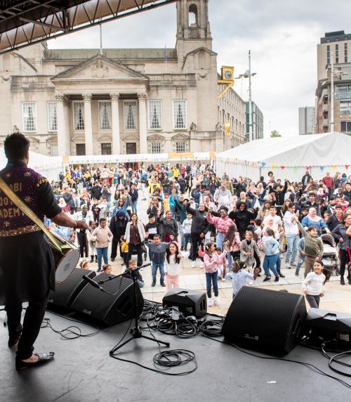 Crowds enjoying the main stage acts at the Yorkshire Integration Festival 2022