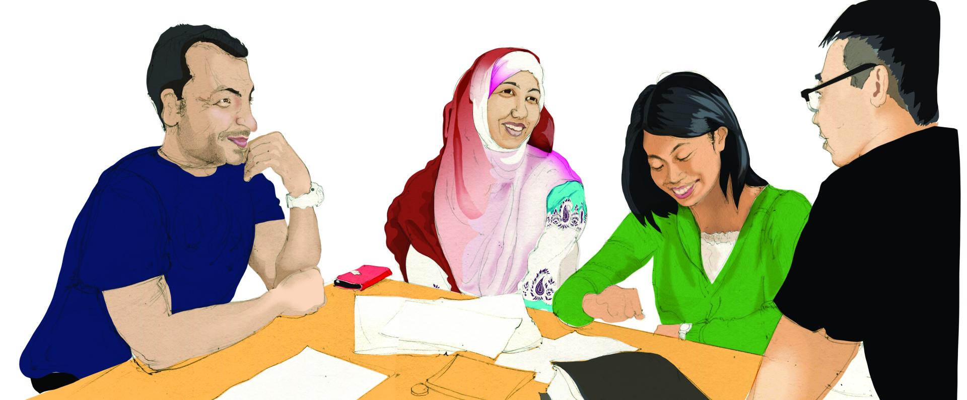 People sitting together at a desk